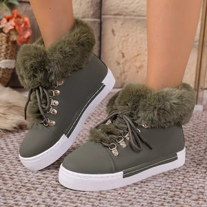 Army green fluffy cuff round-toe platform boots with white soles and laces.