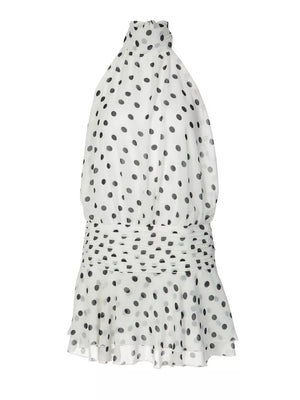 White polka dot halter neck mini dress with ruched waist and ruffled hem