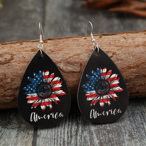 Black teardrop earrings with American flag sunflower design and "America" text