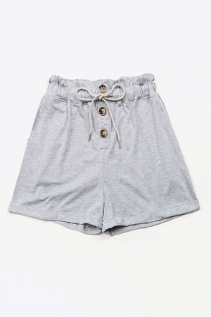 Light gray paperbag waist shorts with button front and drawstring tie.