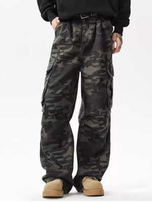 Relaxed fit dark camouflage cargo pants with multiple pockets and adjustable waist.