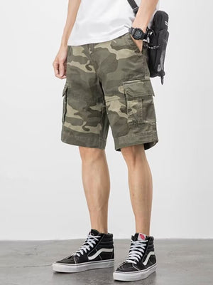 Men's plus-size relaxed fit cargo shorts in green camouflage with multiple pockets.