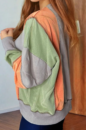 Colorblock sweatshirt with contrast stitching and ribbed cuffs.
