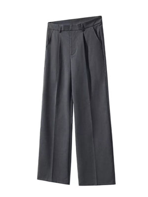Grey pleated wide-leg trousers with pockets and a casual contemporary style.
