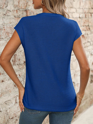 Royal blue seamed knit sleeveless v-neck top with a textured finish.