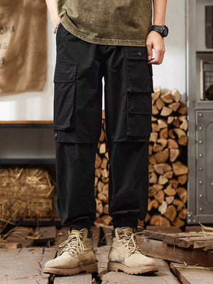 Black relaxed fit cargo pants with multiple pockets and elastic cuffs.