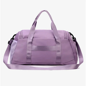 Mauve nylon duffle bag with mesh pocket and adjustable strap