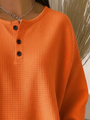 Full Size Waffle Knit Button Detail Top Plus Size in Orange, fabric detail