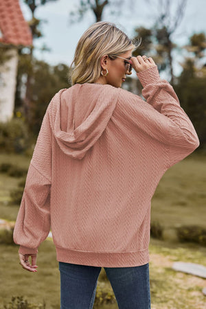 Textured cable knit hoodie in Dusty Pink with a relaxed fit and dropped shoulders.