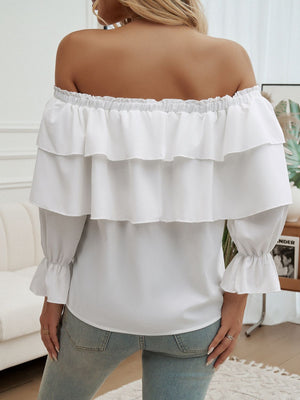 White tiered ruffle off-shoulder blouse with ruffled cuffs and tie detail