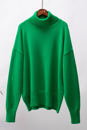 Mid Green relaxed roll-neck sweater with a boxy knit and ribbed cuffs and hem.