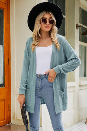 Air Force Blue cardigan with pockets and chevron pattern.
