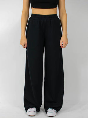 Black wide-leg lounge pants with elastic waistband and pockets