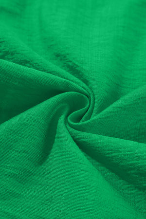 Green colorblock puff sleeve blouse fabric detail