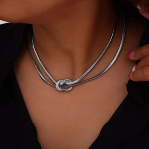 Silver knot detail serpent necklace with double chain