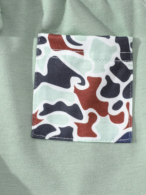 Sage green baby polo with camouflage pocket detail
