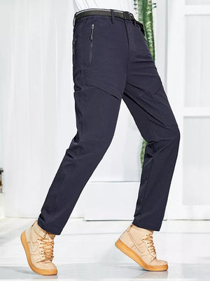 Men's dark blue sweatpants with zippered pockets and a relaxed fit.