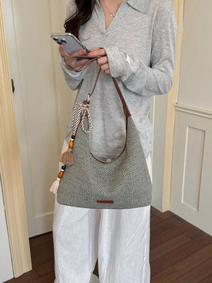 Tassel Woven Shoulder Bag in Sky Blue, back view