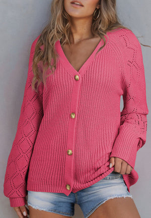 Hot pink diamond-cut sleeve knit cardigan with gold buttons and v-neck.
