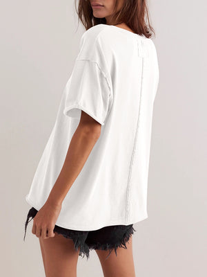 White oversized cotton tee with seam detail and raw edges