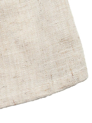 Linen-blend cami and skort ensemble in natural beige with textured weave and contrast trim detail.