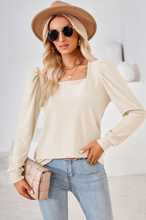 Ivory diamond-textured puff sleeve top with square neckline