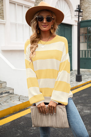 Yellow and cream striped oversized knit sweater with balloon sleeves.