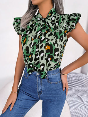 Green leopard print blouse with ruffled sleeves and pussybow tie neckline.