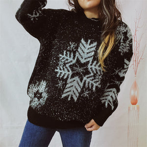 Black acrylic knit sweater with silver snowflake pattern and metallic threads.