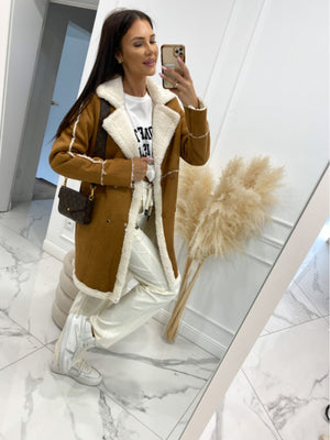 Camel suede effect overcoat with shearling trim and collar.