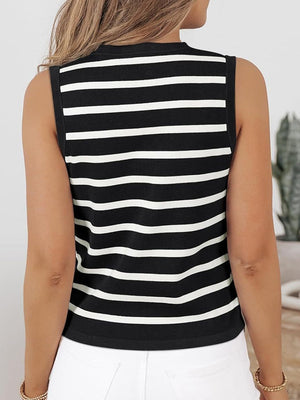 Black and white striped knit top with a mock neck and sleeveless design.