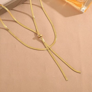 Gold layered snake chain necklace with adjustable knot detail