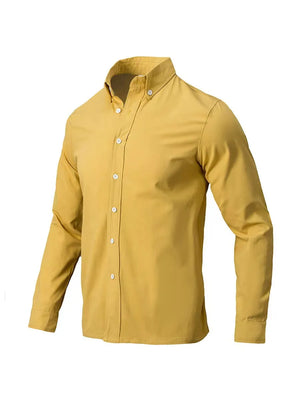 Gold Oxford button-down shirt with a relaxed fit and button closure.
