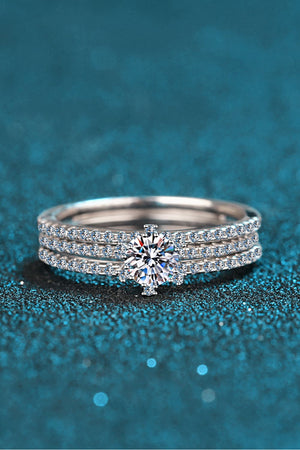 Silver ring trio with a central diamond and pavé band details