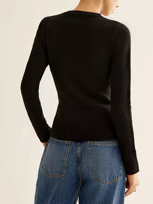 Black button-down slim fit cardigan with long sleeves and a textured knit.
