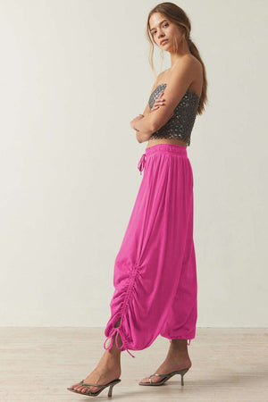 Hot Pink gathered ankle-tie balloon trousers with drawstring waist and ruched detail
