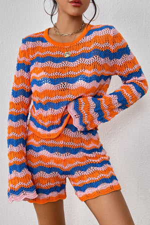Crochet flare set in orange-red with blue and pink wavy stripes and bell sleeves.