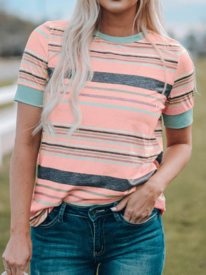 Striped crew neck t-shirt in dusty pink with multi-color stripes and teal cuffs.