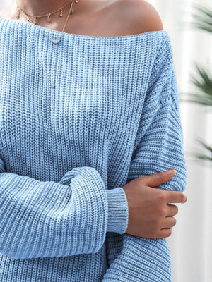 Off-shoulder ribbed knit mini dress in Pastel Blue, 100% acrylic, with a relaxed fit and long sleeves.