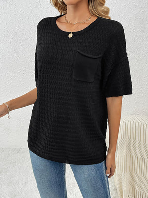 Black textured knit t-shirt with boxy silhouette and chest pocket