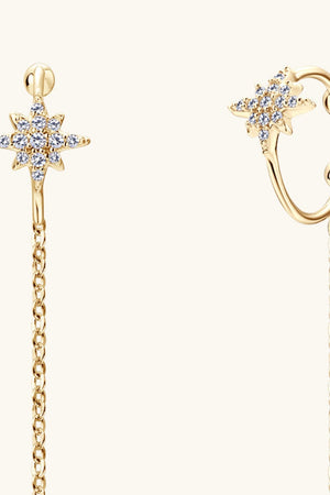 Gold moissanite starburst threader earrings with delicate chain detail.