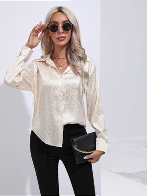 Champagne satin leopard print button-down shirt with a collared neckline and long sleeves.