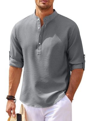 Gray textured henley shirt with roll-up sleeves and button detail