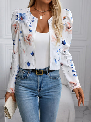 White floral puff sleeve cropped zip jacket with round neckline and silver zipper.