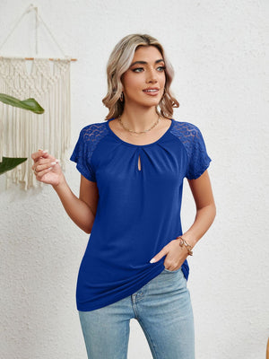 Royal blue polyester blouse with keyhole neckline and lace cap sleeves