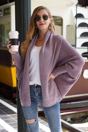 Lavender cocoon knit sleeve cardigan with shawl collar and textured sleeves.