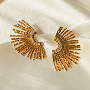 Gold fan earrings with crystal accents and textured rays
