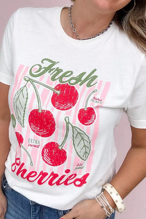 White oversized maternity tee with vintage cherry graphic and pink stripes.
