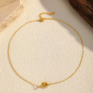 Gold-plated knot pendant necklace with delicate chain