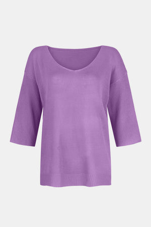 Lavender V-neck knit sweater with flared 3/4 sleeves and ribbed cuffs.